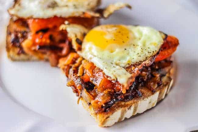 Fried Eggs with Charred Tomatoes and Caramelized Onions